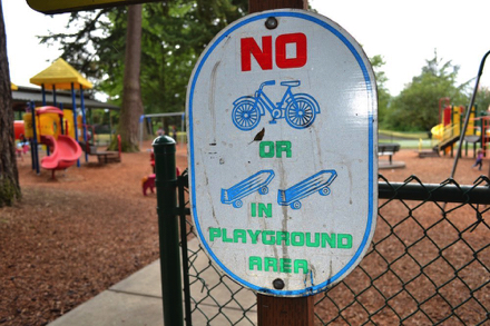 Dogs, skateboards and bikes are not allowed in the playground area